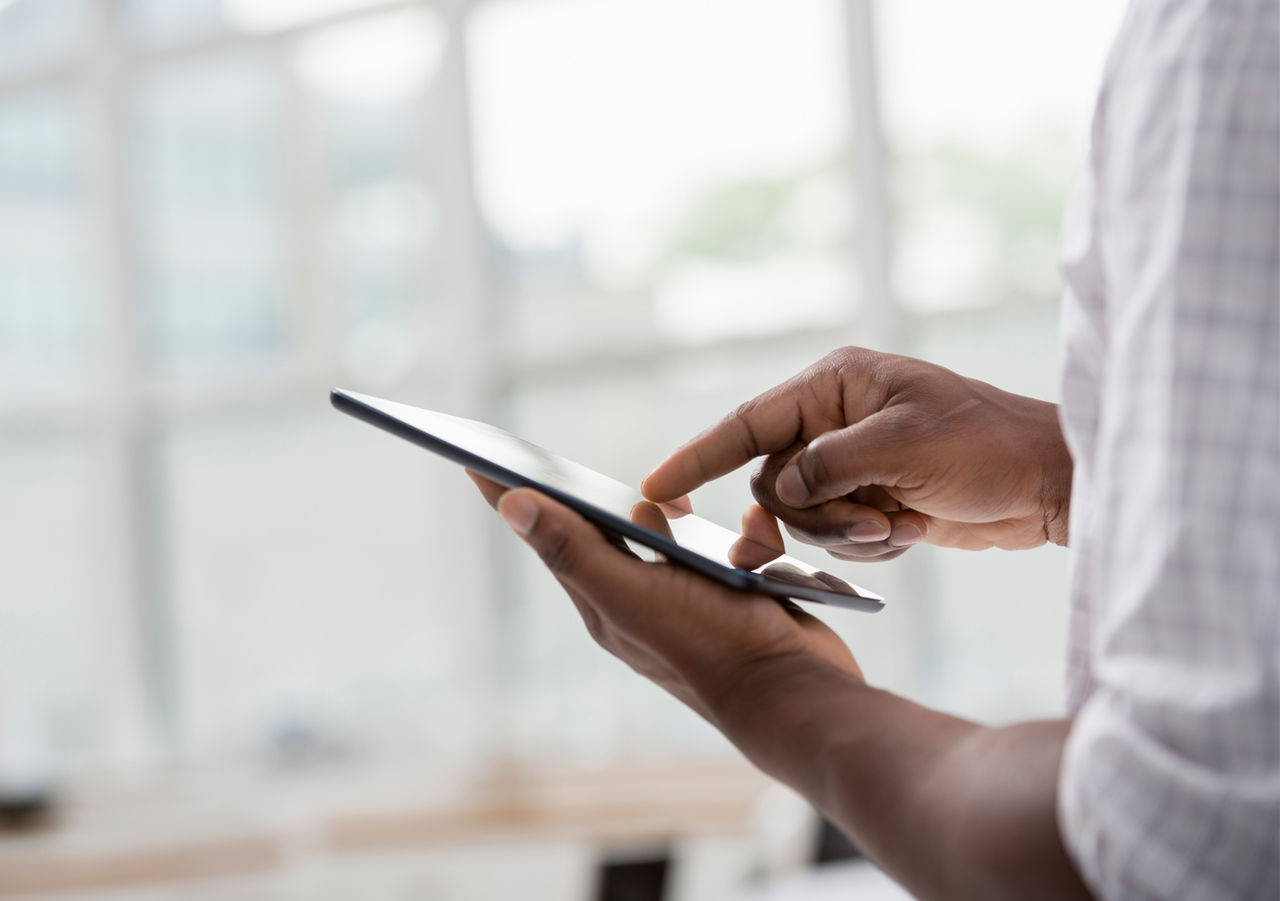 business man using tablet